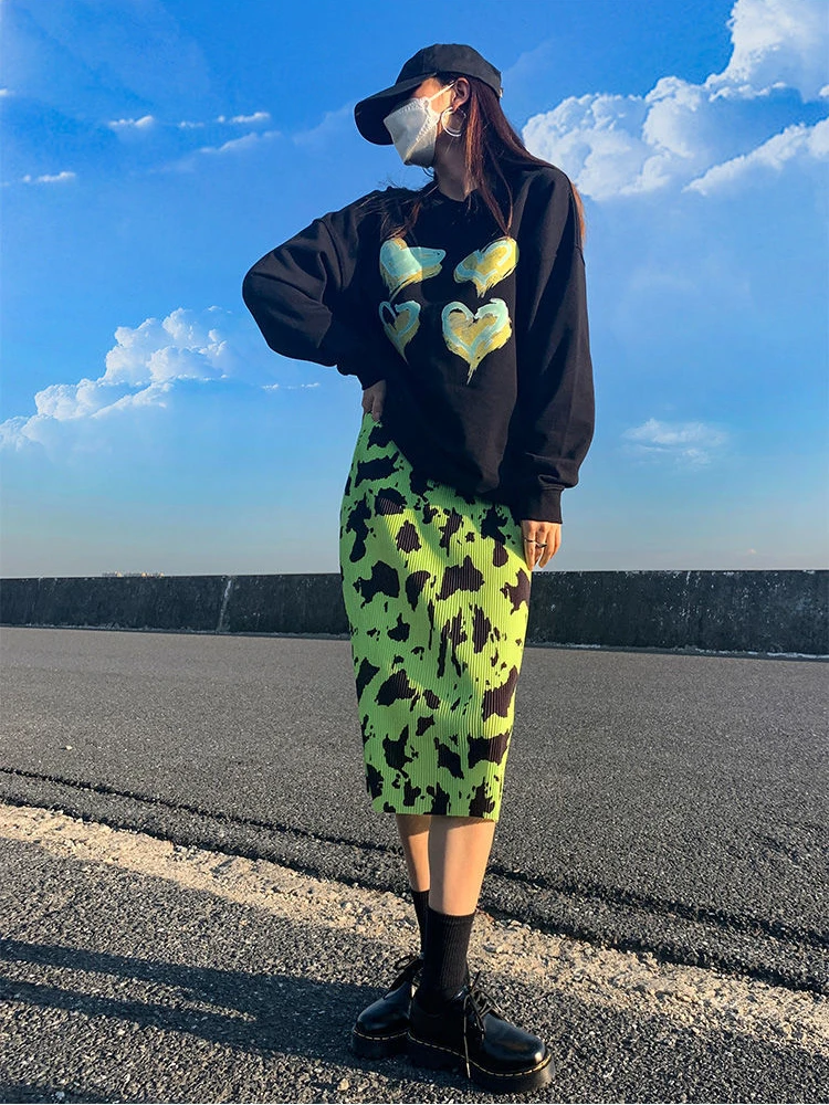 green printed midi skirt