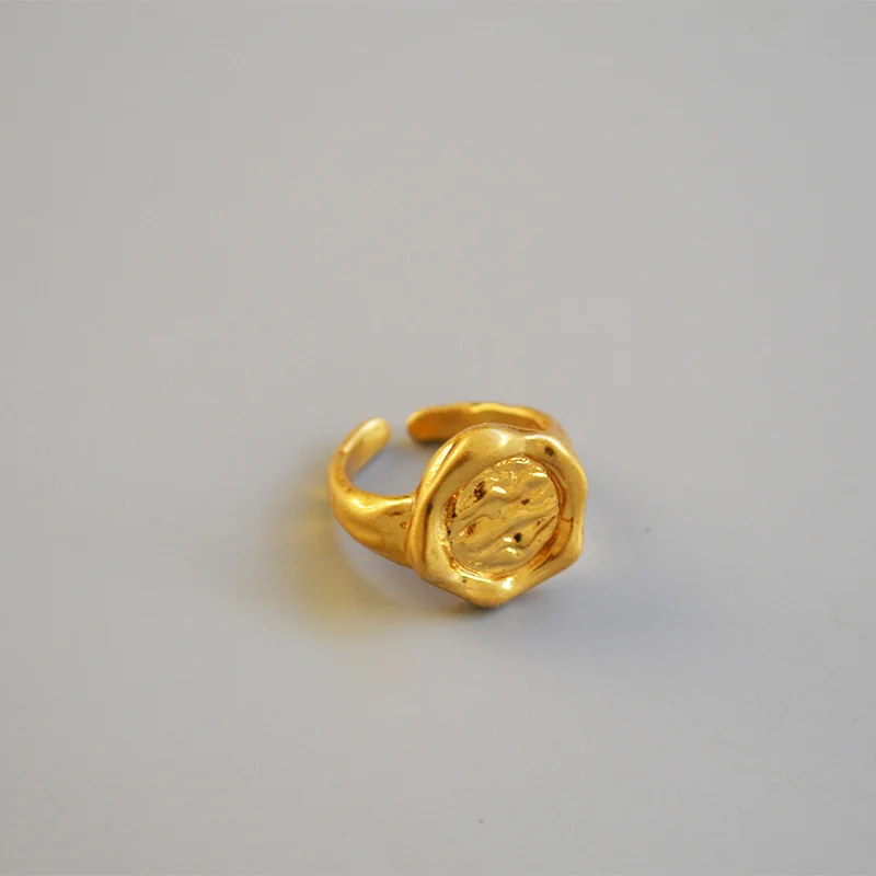 

Small niche design with irregular concave and convex texture abstract pattern, brass plated ring, index finger ring
