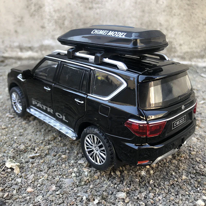 سيارة دفع رباعي معدنية نموذج باترول مزودة بحامل سف...