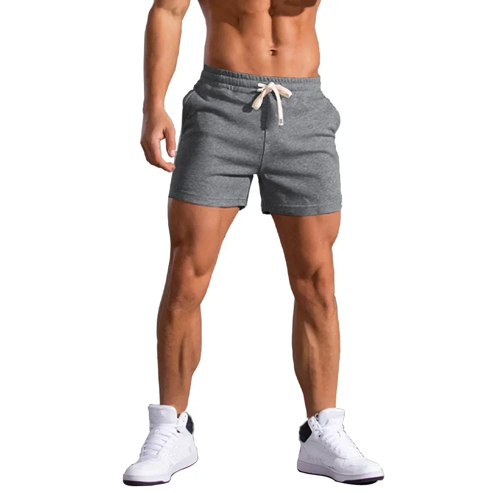 2025 Mens Gym Summer Fitness Shorts White Breathable Surffing Seaside Resort Solid Running SportswearElastic Casual Sport Shorts