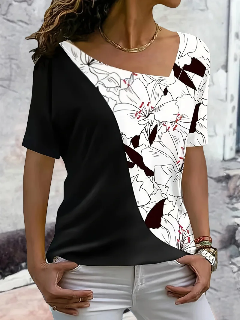 

2024 SpringSummer New Black White Floral Print Fashion Oblique V-neck Color Collision Splicing Large Size Short-sleeved T-shirt