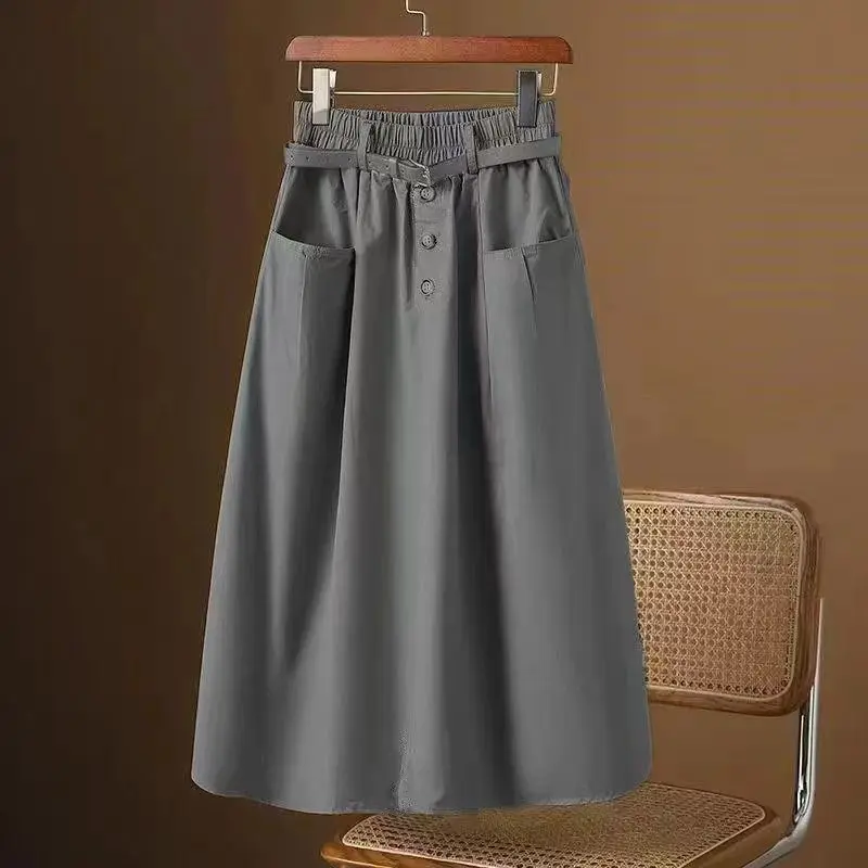 Korean version Summer High waisted Skirt 2026 New Female Solid color Loose Casual Workwear Pocket Half body A-line Skirts
