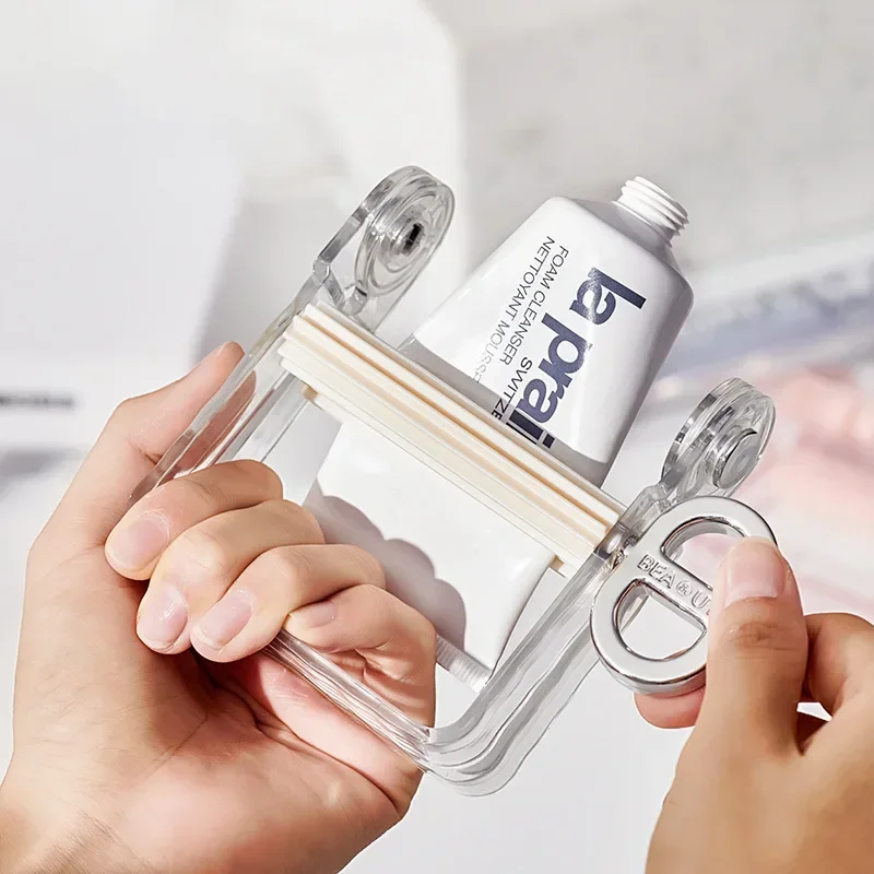1 Pcs Rolling Tube Toothpaste Squeezer Rotatable Handle Toothpaste Dispenser Squeeze Tool Bathroom Accessories toothpaste squeezer