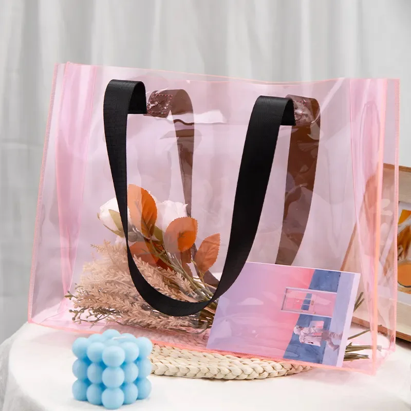 200pcs 뜨거운 판매 숙 녀 럭셔리 PVC 재사용 가능한 컬러 홀로그램 토트 백 긴 핸들 사용자 지정 PVC 쇼핑백