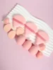A 12 Piece Set of Versatile Makeup Sponges, Consisting of 3 Loose Powder Puffs, 3 Mini Cushion Powder Puffs, 3 Beauty Eggs, and 6