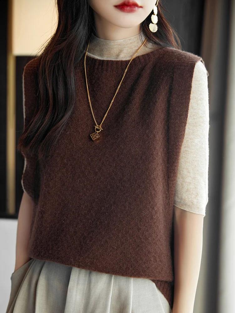 Naiste 100% meriinovillast o-kaelusega lohvaka lõikega vest S-XL 1