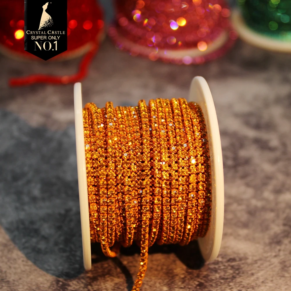 Gold Rhinestone Tassel Chain Roll with Crystal Ribbon Trim