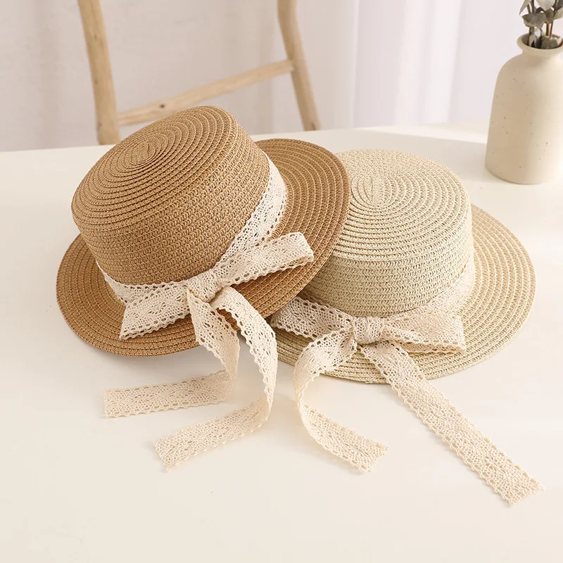 Child Summer Sun Hat Bucket Cap Simple Lace Bowknot Ribbon Flat Top Straw Hat Beach Outing Caps Panama