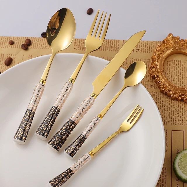 Gold Flatware Set With White Handle