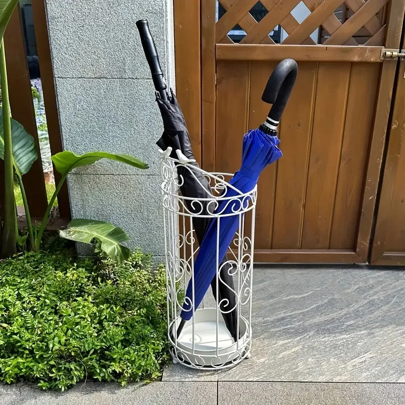 Space-Saving Umbrella Stand Conveniently stores multiple umbrellas and rain gear at home or office