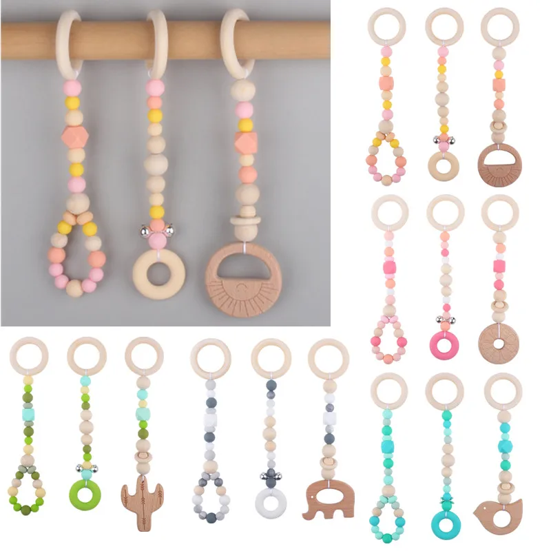 

3Pcs Baby Fitness Gym Frame BPA Free Wooden Ring Stroller Hanging Pendants with Bells Silicone Beads Baby Rattle Toys Room Decor
