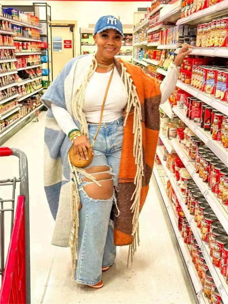 Женская длинная куртка с бахромой