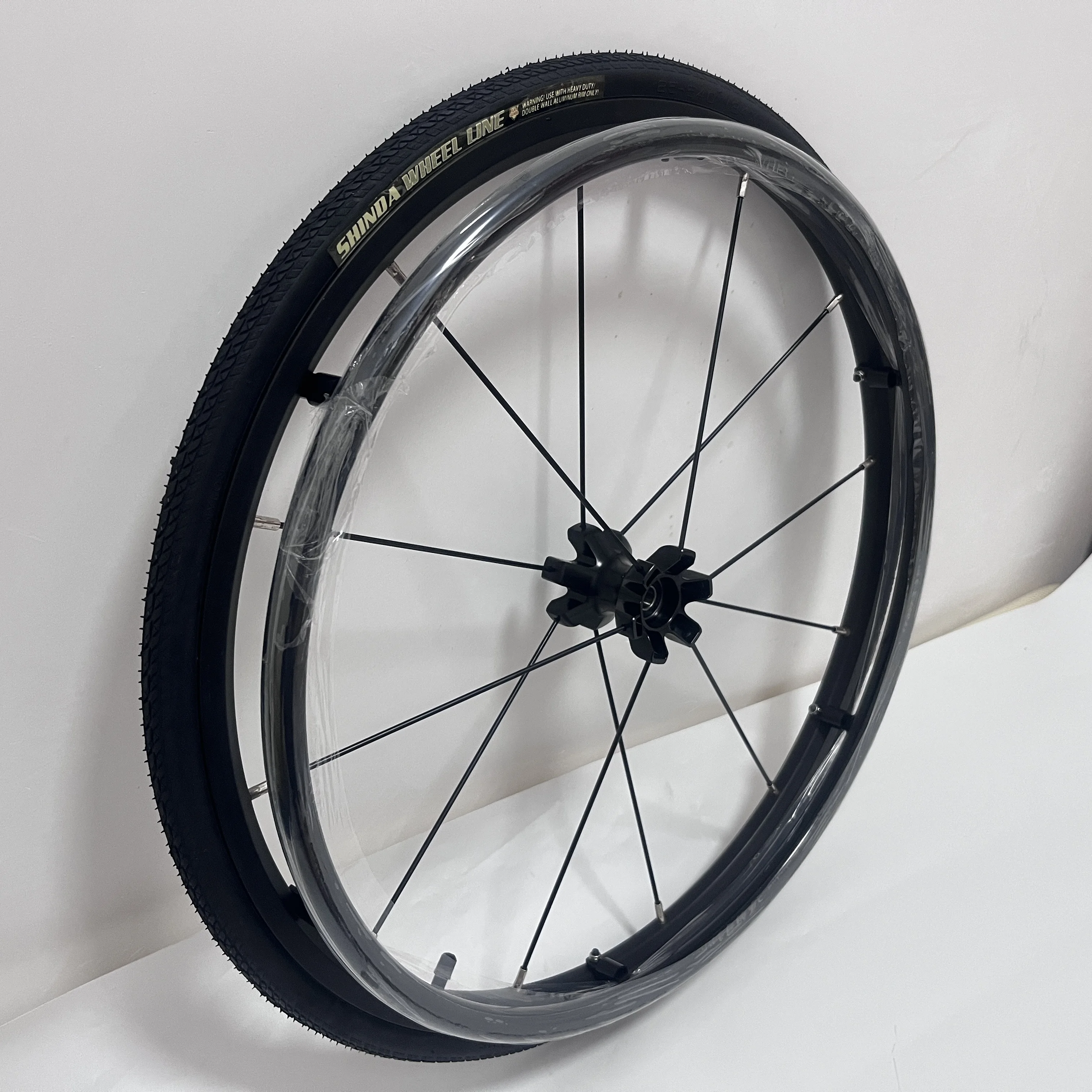 1 pair of 24 inch sports wheelchairs with black large wheels, 24 &times; 1 anti slip inflatable wheels, aluminum alloy and rub