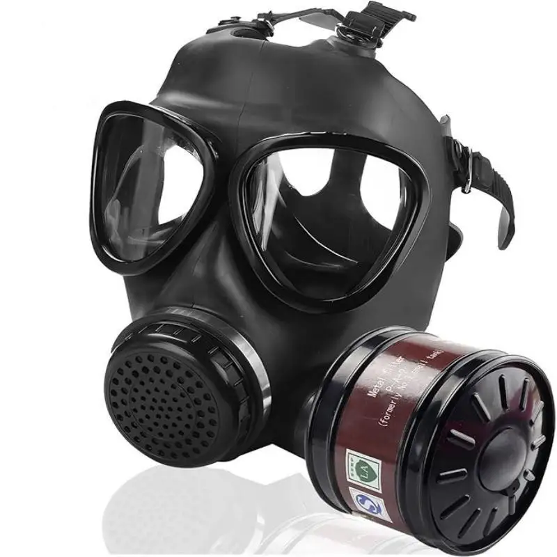 Filtre remplaçable pour masque anti-poussière chantier, posé à côté du masque en silicone confortable