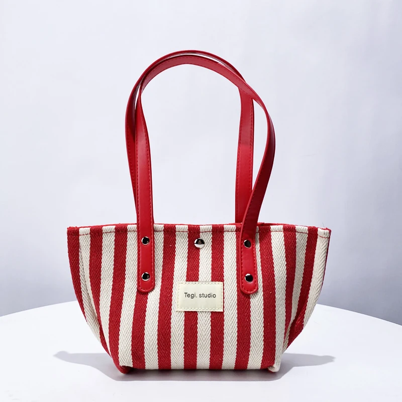 thumbnail image 1 of Bolsos de lona a rayas de estilo japonés para mujer, bolsos y carteras de diseñador de lujo, novedad de 2024, con letras pequeñas, de tela para las axilas, 1 of 4