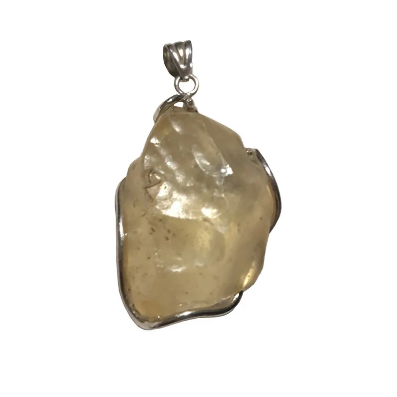 

Libyan meteorite impact glass S925 silver inlaid with shape pendant weight 8.8 grams size 33.9*23.3MM