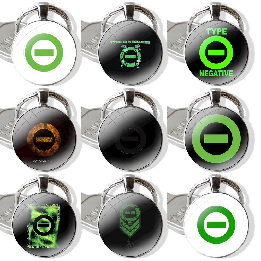 

Cartoon Fashion Design Creative Glass Cabochon Keychain Pendant Car Key Chains Handmade Type O Negative Classic Symbol
