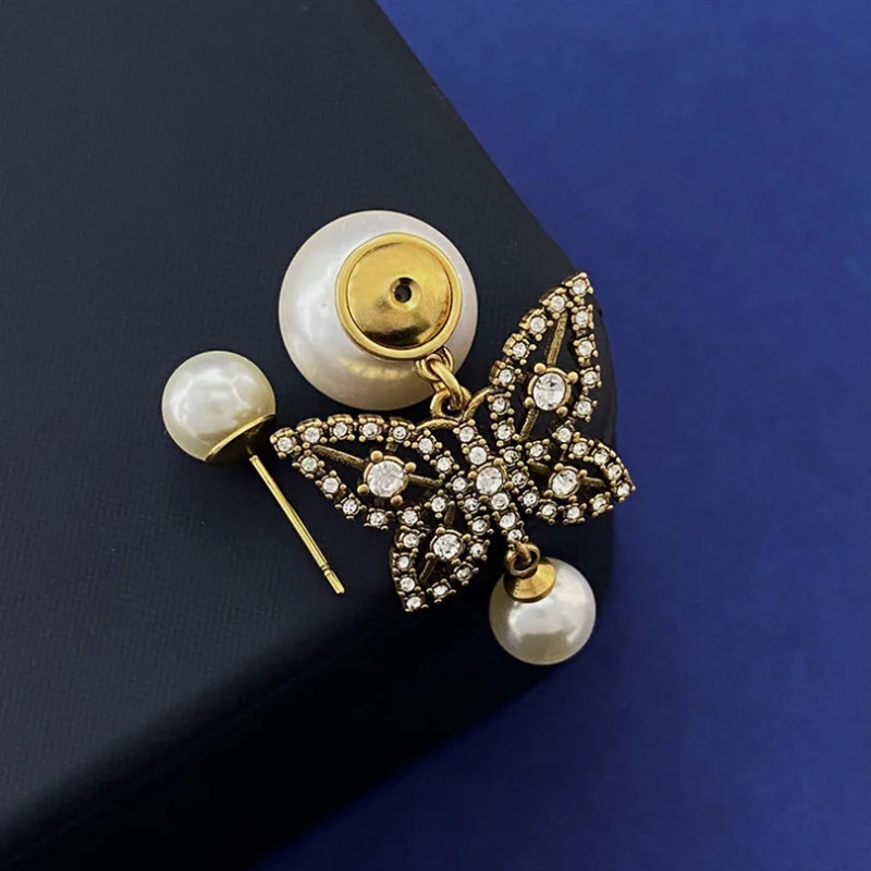 Donia Jewelry Fashion New Butterfly Titanium Steel Micro-Inlaid AAA Zircon Silver Needle Luxury Palace Pearl Earrings.