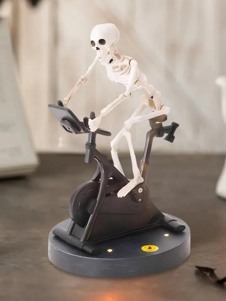 Whimsical Skeleton Riding Bike Decoration Statue