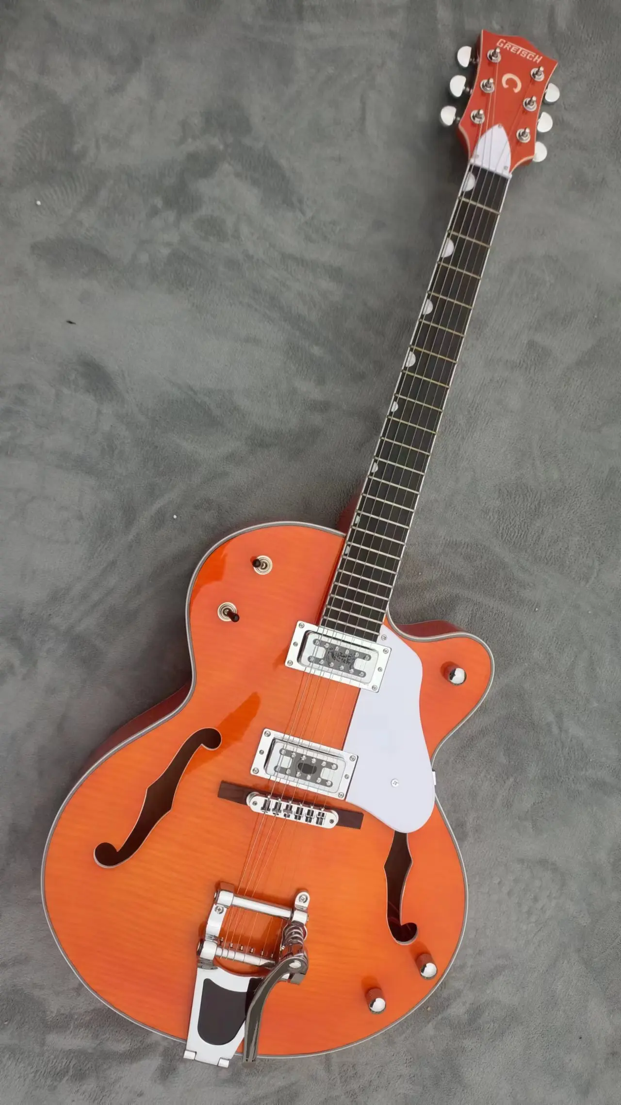

G6120S large rocker electric guitar, orange tiger veneer body, I-shaped pickup, metal white pieces, can be modified and customiz