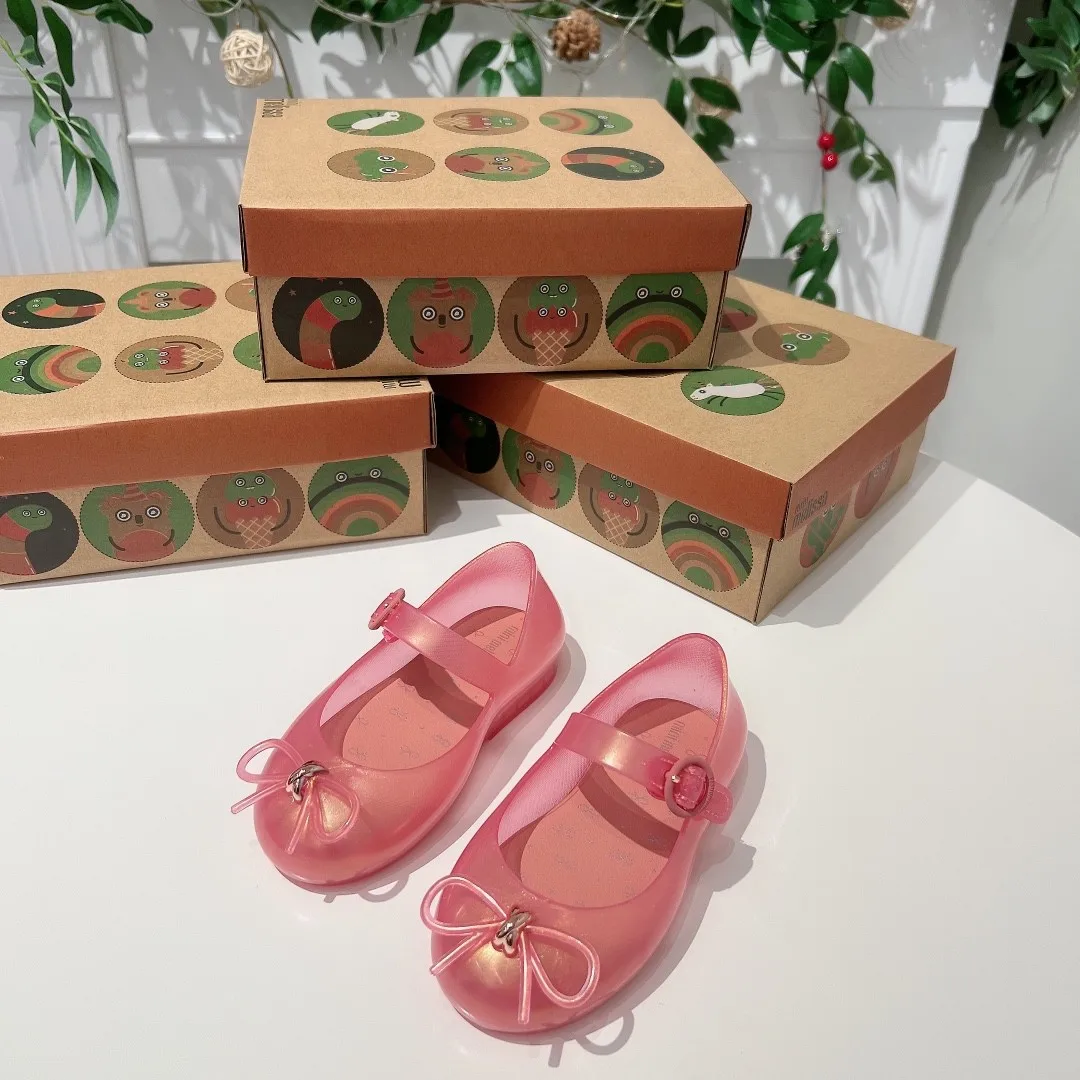 Description Picture 5 of itemClassical Little Bowknot Silver Girl Spring Jelly Shoes Princess Fashion Flat Single Shoes Children PVC Soft Beach Sandal HMI102
