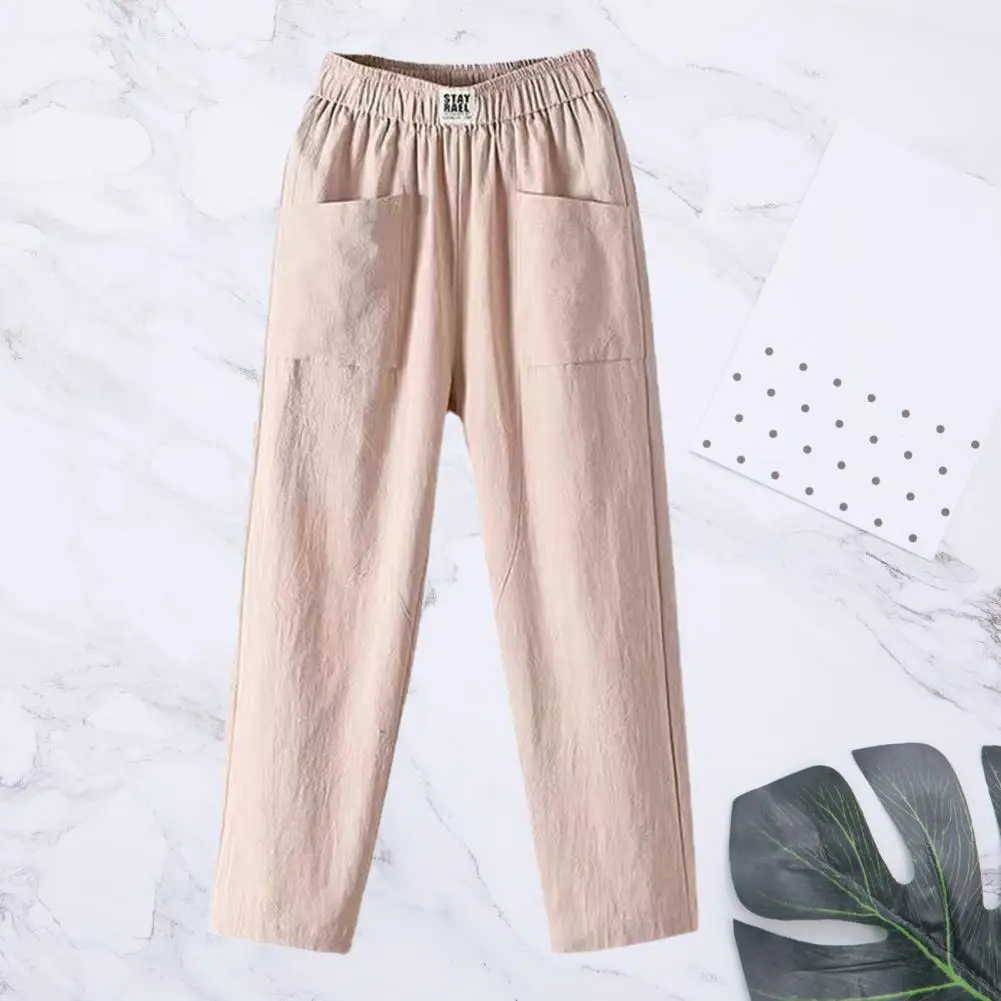 Pantaloni da donna tasche elastiche in vita pantaloni estivi pantaloni lunghi da donna in canapa di cotone sciolto tasche in tinta unita pantaloni da donna Streetwear