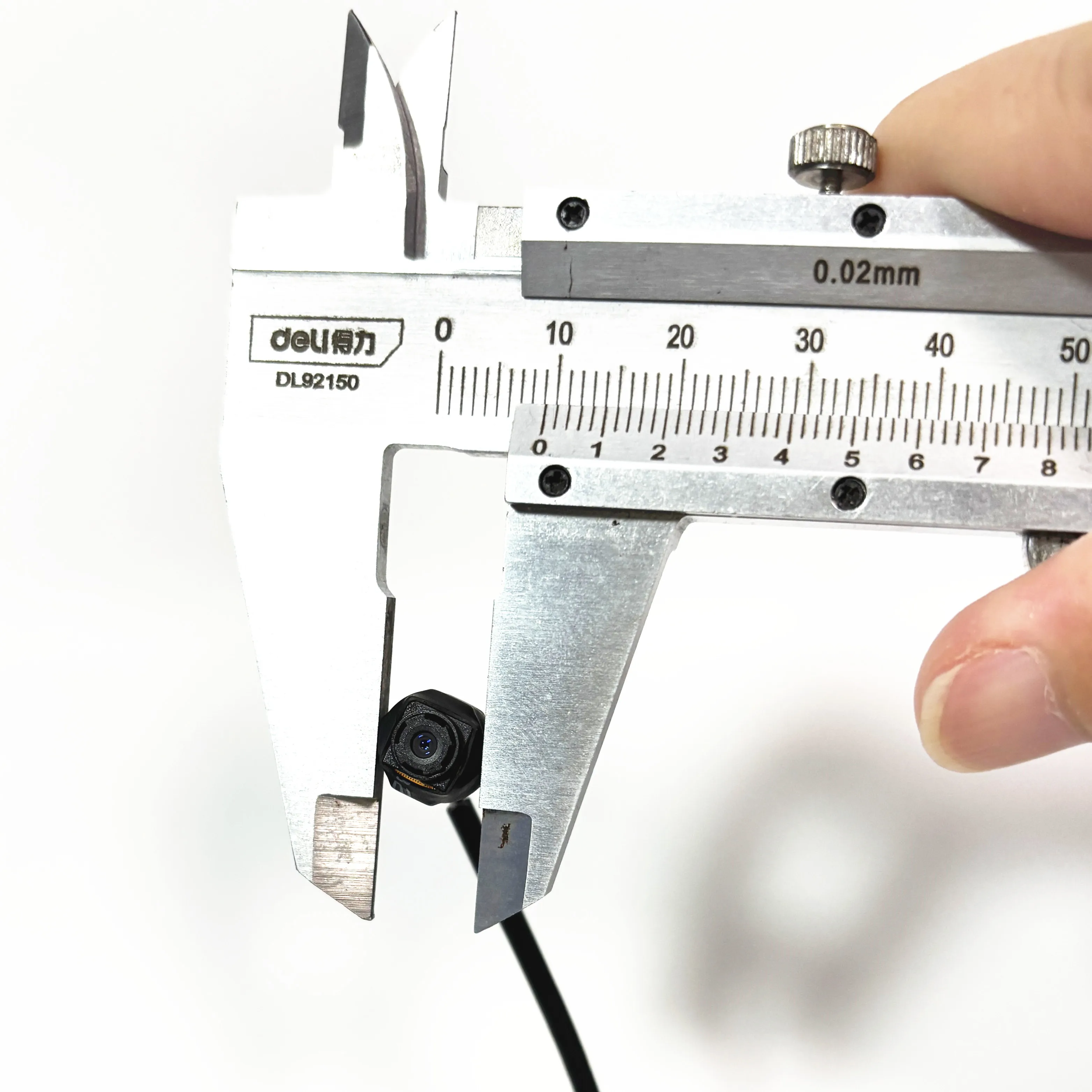 Close-up of a compact industrial mini camera module