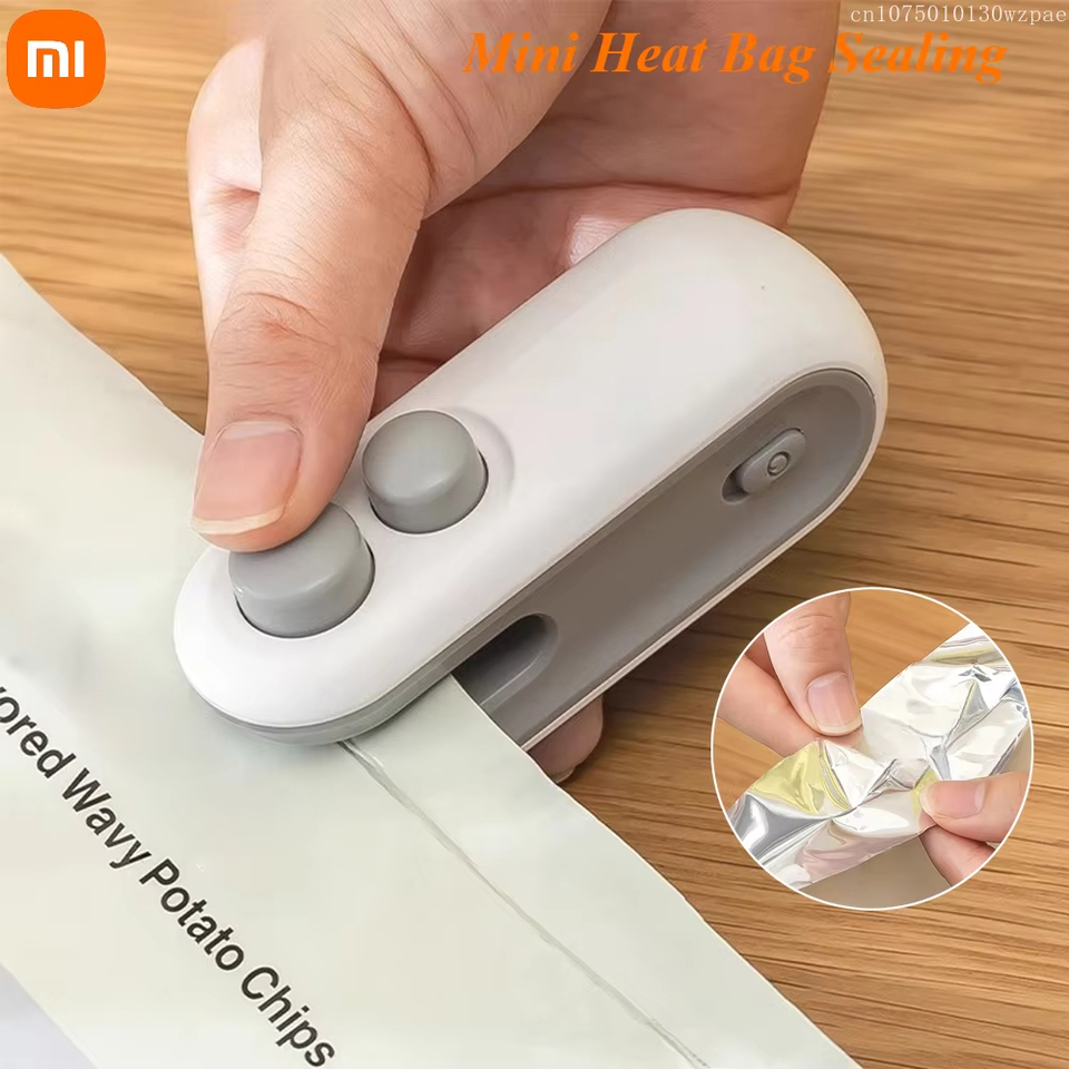 Xiaomi Mini Heat Bag Sealing Food Packaging Heat Sealer Machine Package Sealer Bags Plastic Food Sealer Clip Bag Handheld Sealer