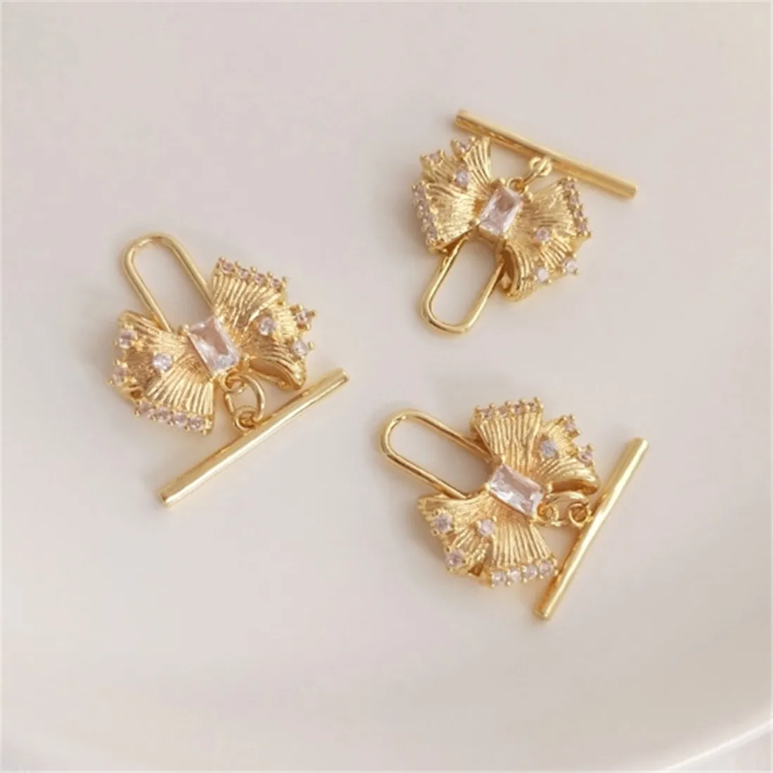 14K Gold Inlaid Zircon Fashion Bow OT Buckle Diy Pearl Necklace Pendant Buckle Jewelry Accessories B888 14k gold plated zircon double ear rabbit style with needle sticking half hole pearl holder hanging pearl holder diy accessories