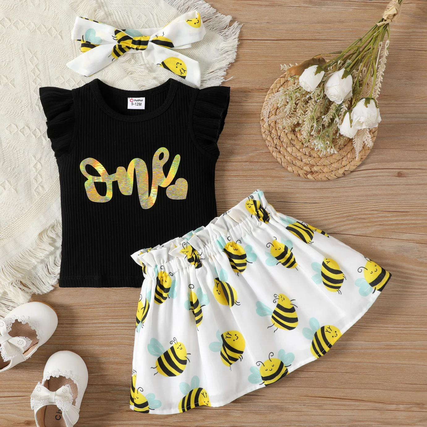 

PatPat 3pcs Baby Girl Cotton Ribbed Flutter-sleeve Letter Graphic Top and Allover Bee Print Skirt & Headband Set