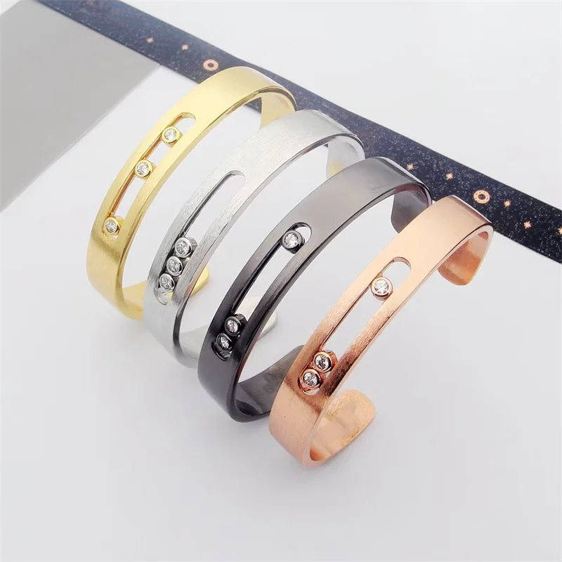 

Классические роскошные украшения с тремя движущимися камнями. Роскошный браслет с мобильным титановым геометрическим отверстием для пар