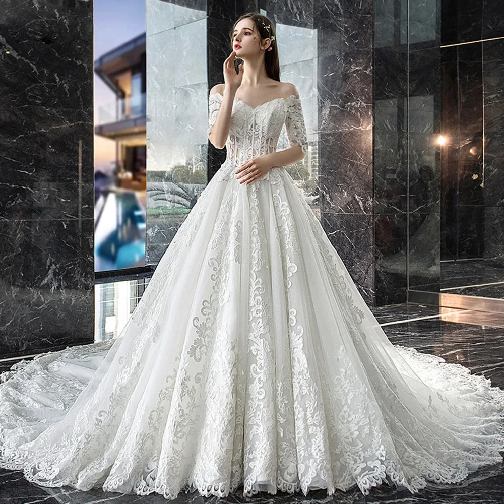 

Princesse Half Sleeves Tulle Wedding Dress Robe De Mariee Sweetheart Neck Abito Off the Shoulder Sukienka Na Wesele فساتين طويلة