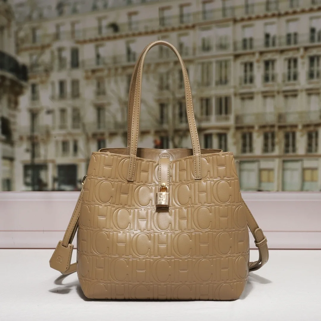 CILMI HARVILL CHHC 2023 Women's Bucket Bag New Single-shoulder Cross-body Portable Perforated Design Italic Letter Opening