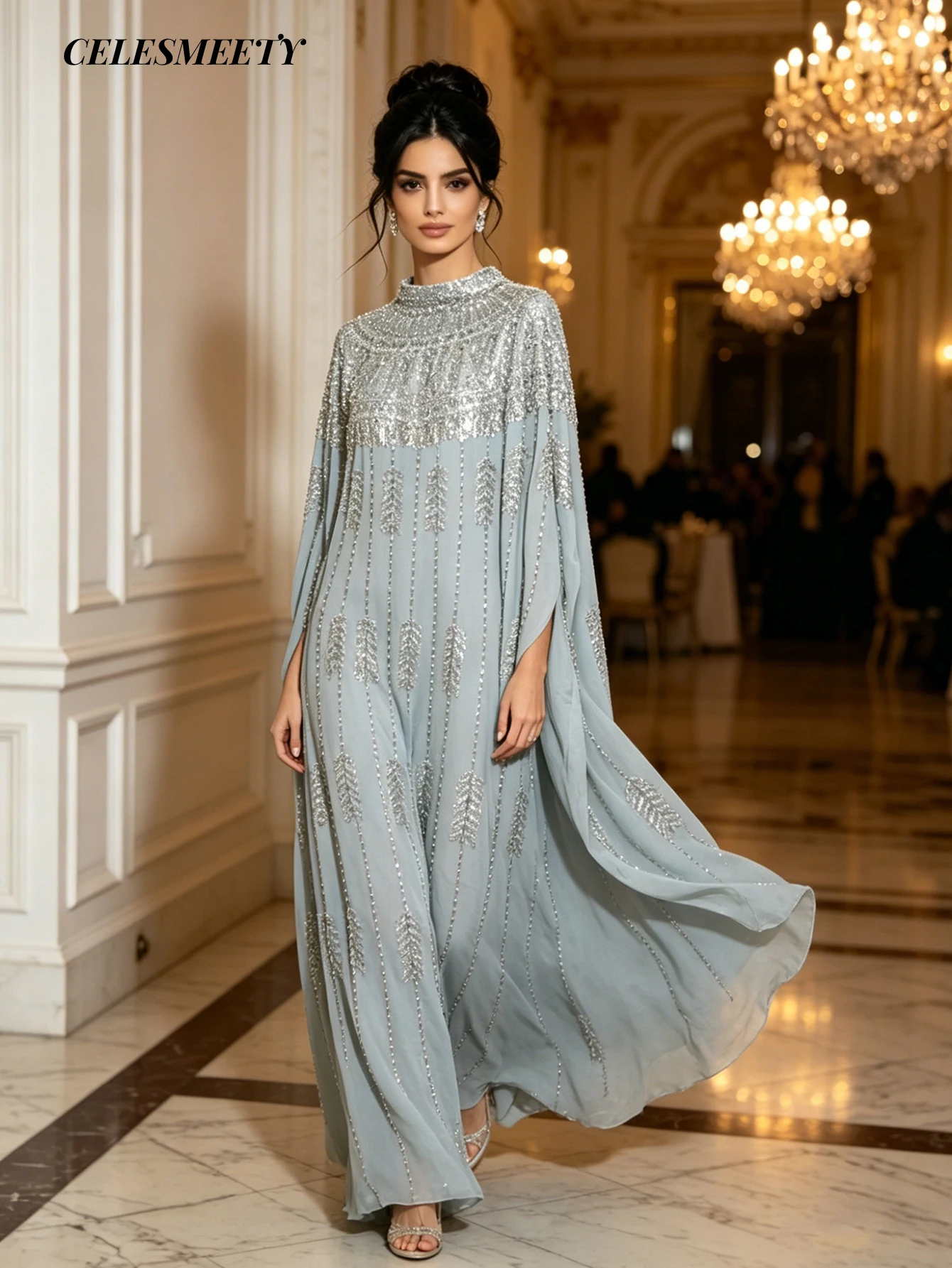 Luxury evening gown with a royal style decorated with beads and shiny embroidery, elegant blue striped chiffon gown with batwing s...