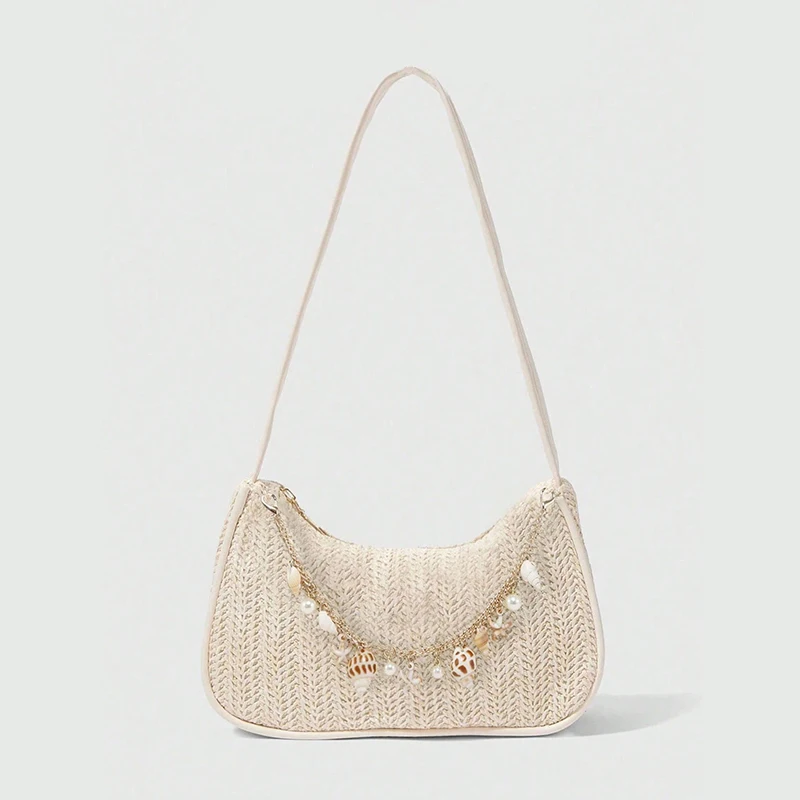 שקית מלבנית עם עיצוב ייחודי וקישוט עם שרשרת מתכת בצורת קונכיה וכוכב ים, צבע פשוט ואיכותי.