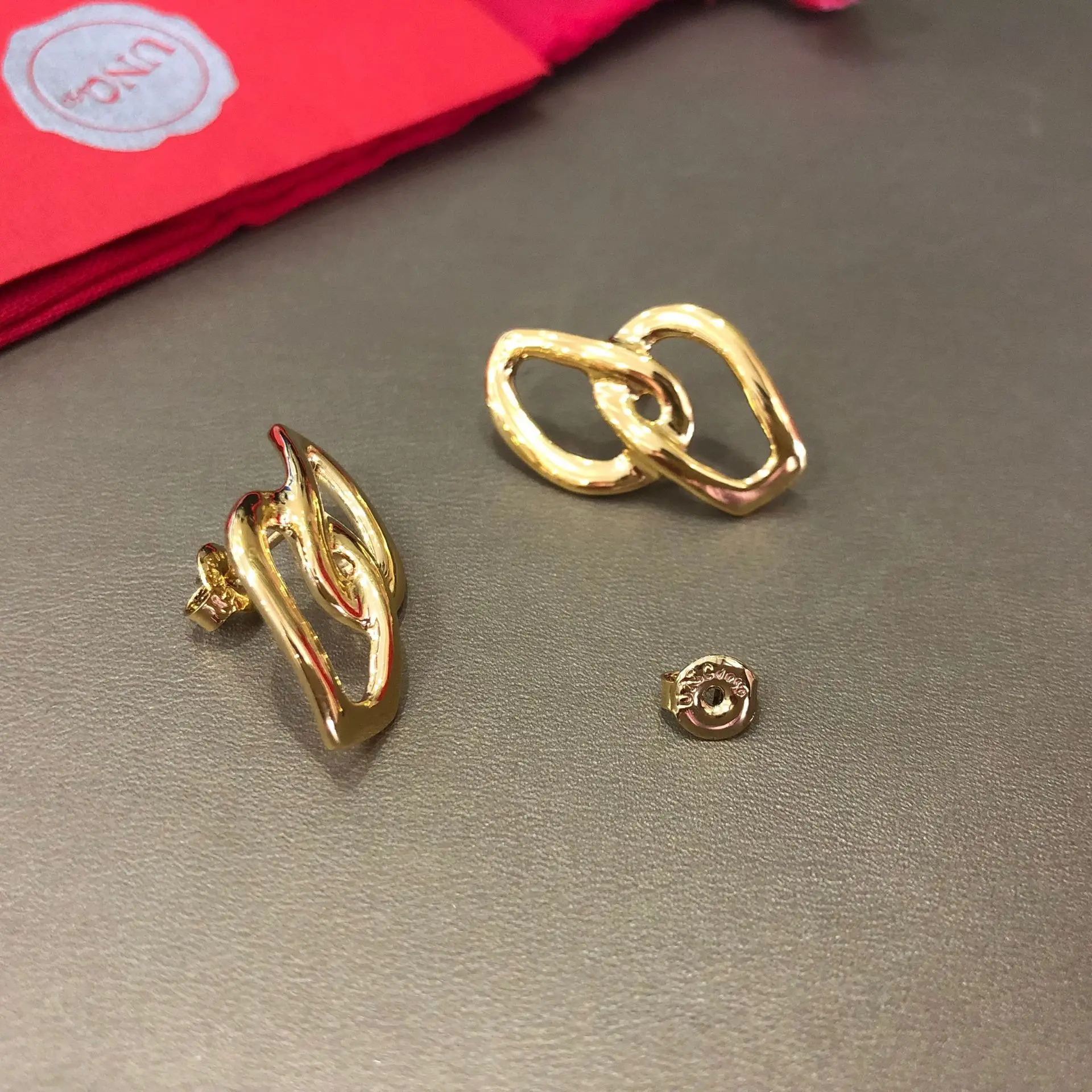 2022 Hot Fashion Women's Silver gold Geometric Magic Eye earrings UNO 50 unique European and American style