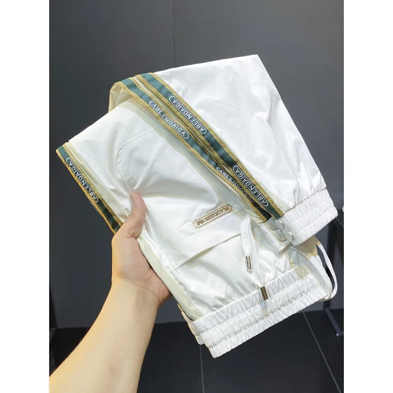 2024 Summer Ultra Thin Ice Silk Side Stripe Tie Feet Casual Pants For Men'S Fashion Brand Slim Fit Drawstring Nine Point Sports