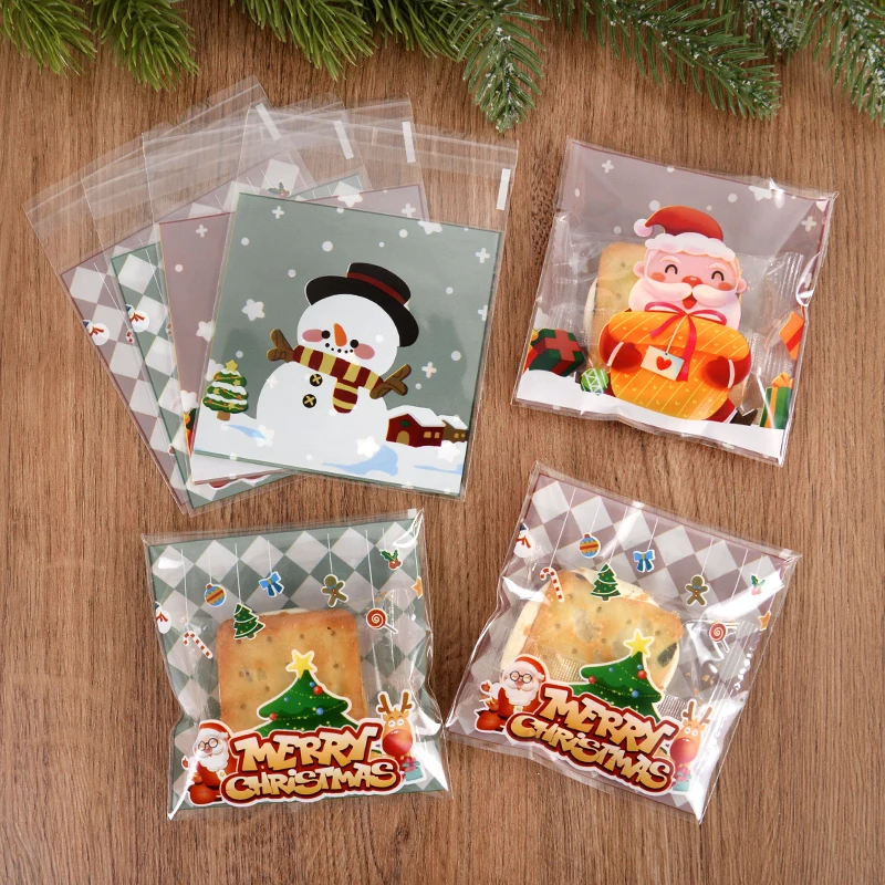 

100pcs Christmas Cookie Gift Bags Snowman Snack Candy Plastic Bag Self-Adhesive Packaging Bags Xmas New Year Party Biscuit Pouch