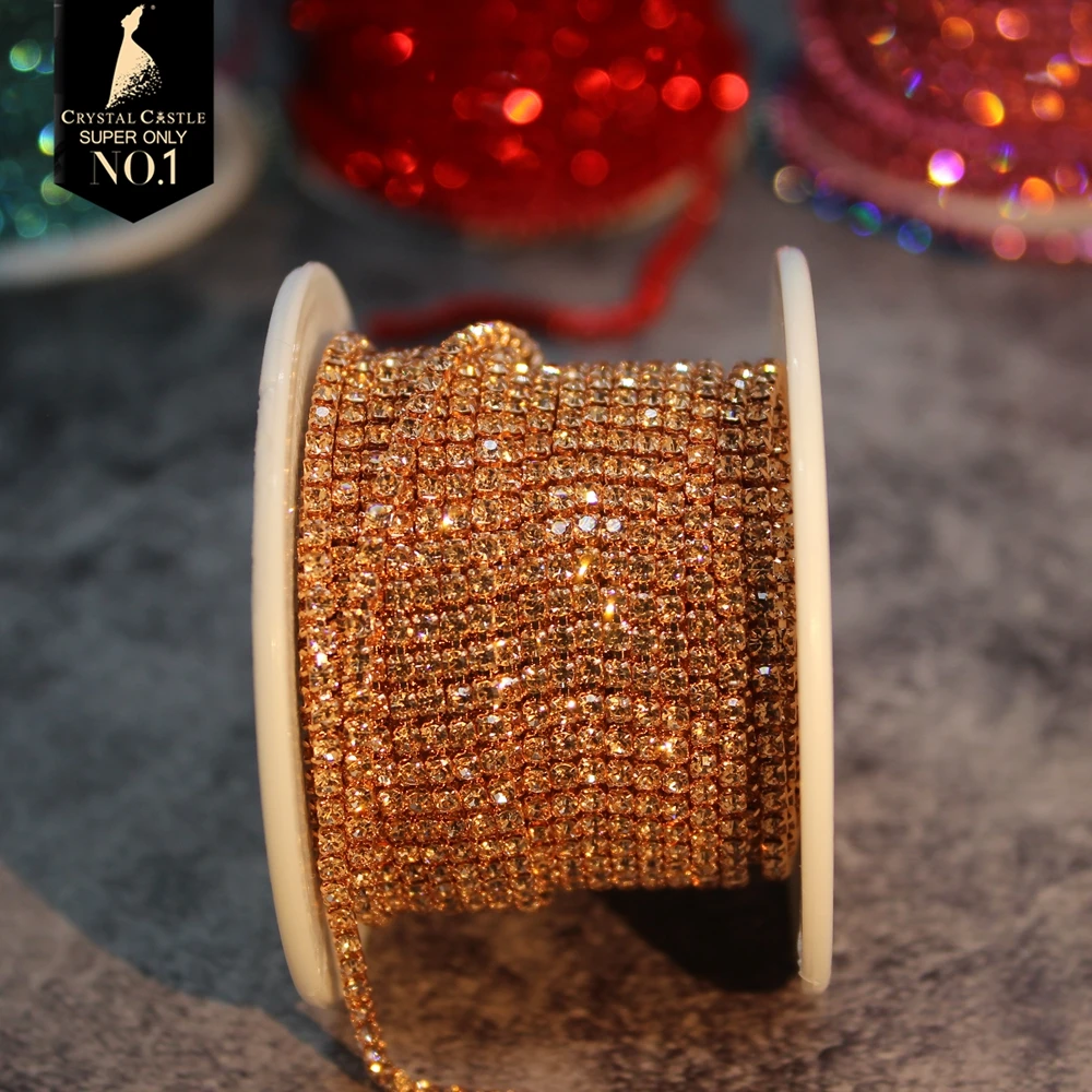 Gold Rhinestone Tassel Chain Roll with Crystal Ribbon Trim
