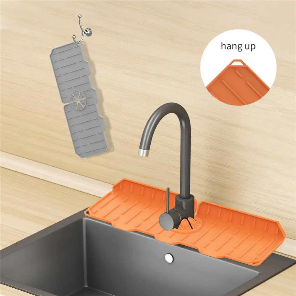 https://ae01.alicdn.com/kf/S5137facfb99145bb9d6d053d8d41a1af0/Silicone-Kitchen-Faucet-Absorbent-Mat-Sink-Protector-Guard-Countertop-Catcher-Drain-Kitchen-Bathroom-Gadgets.jpg