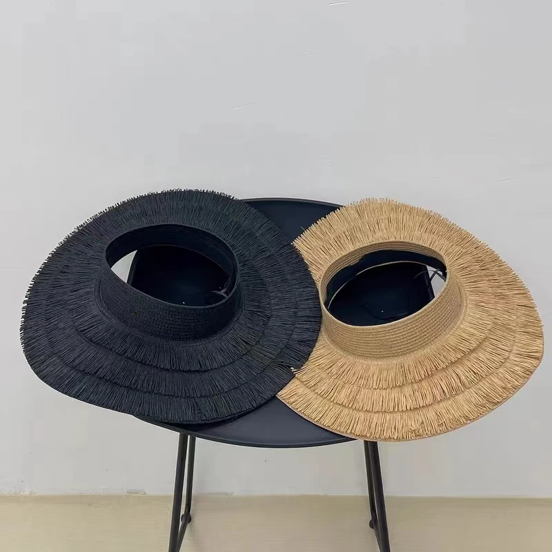 2023 Nowa moda damska Duże okapy Słońce Lato Projektant Plaża Ochrona UV Pusty Top Tassel Słomkowy kapelusz Hurtownie_voghion.com