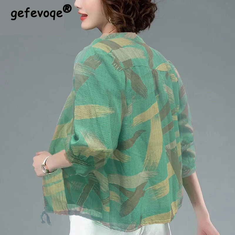 

2023 Women Summer Fashion Print Button Lightweight Sunscreen Shirts Casual Loose 3/4 Sleeve Blouse Female Pockets Drawstring Top