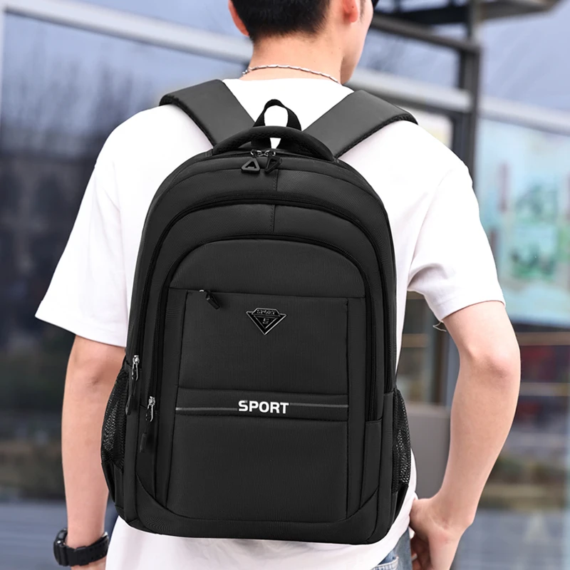 Lightweight business travel backpack, equipped with adjustable shoulder straps, multiple compartments, and polyester lining, lap