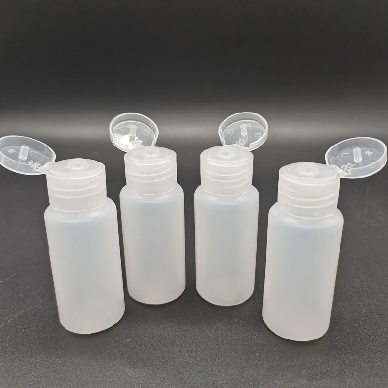 

30pcs 10-50ml PE Translucent Plastic Flip Bottles Butterfly Cap Squeezable Sample Container For Liquid Cleanser Lotion Shampoo