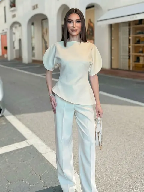 Blouse élégante unie à manches bouffantes et ourlet asymétrique col rond pour femme HH – T-shirts tendance printemps 2026 – Hauts streetwear Y2K pour femme 1
