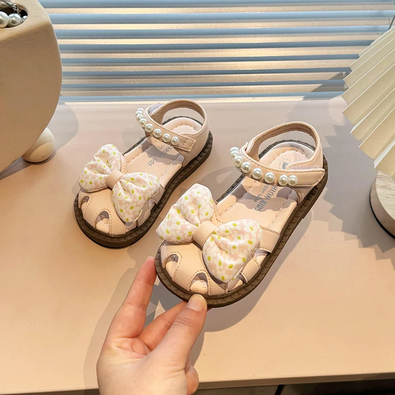 

Children's Sandals Girl 2024 Summer New Girl's Baotou Beach Shoes Bow Soft Sole Princess Single Shoes Popular DDY8805