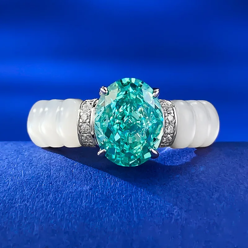 

New European and American S925 Silver White Fritillaria Inlaid 7 * 9 Paraiba High Carbon Diamond Ice Flower Cut Ring Ring