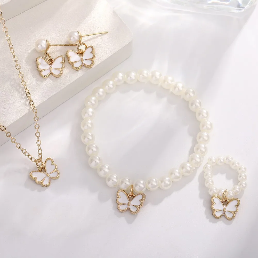 Close-up of butterfly earrings from the jewelry set