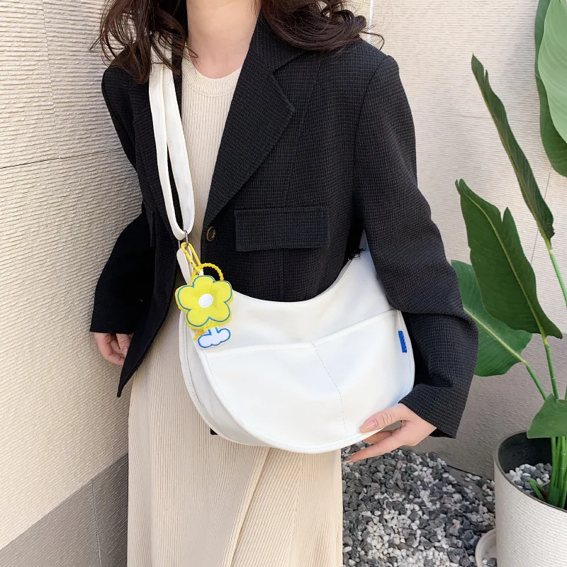 

New solid color women's chest bag large capacity travel design belt bag women's new straddle large capacity canvas bag