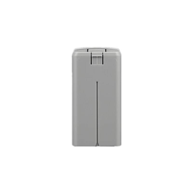 Batterie de rechange pour DJI Mini 2 insérée dans le hub de charge, prête à être rechargée.